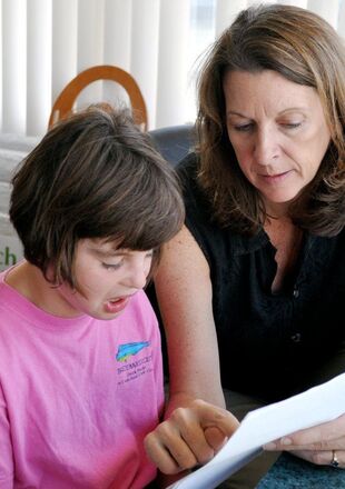 Margaret working with an older child on articulation and speech clarity